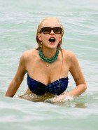 Lindsay Lohan oops boob slip in a bikini