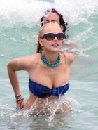 Lindsay Lohan oops boob slip in a bikini