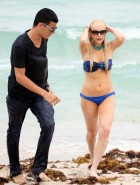 Lindsay Lohan oops boob slip in a bikini